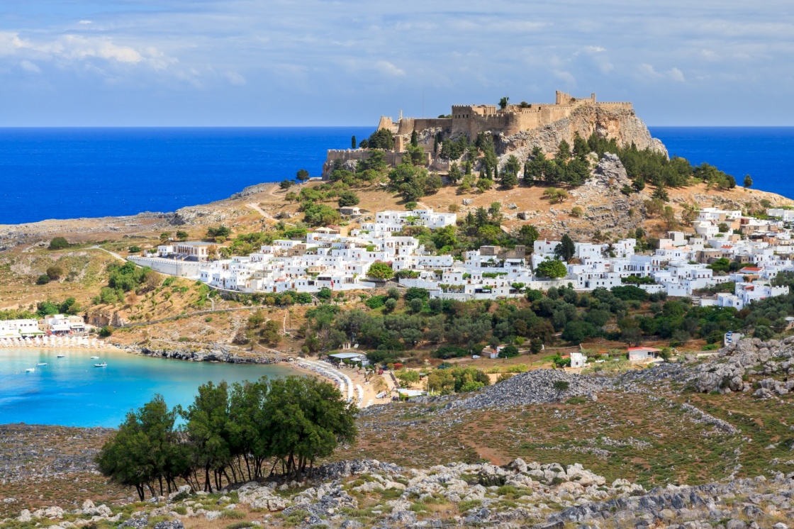 'View from the road down to the popular town of Lindos on the Island of Rhodes Greece' - Rhodes
